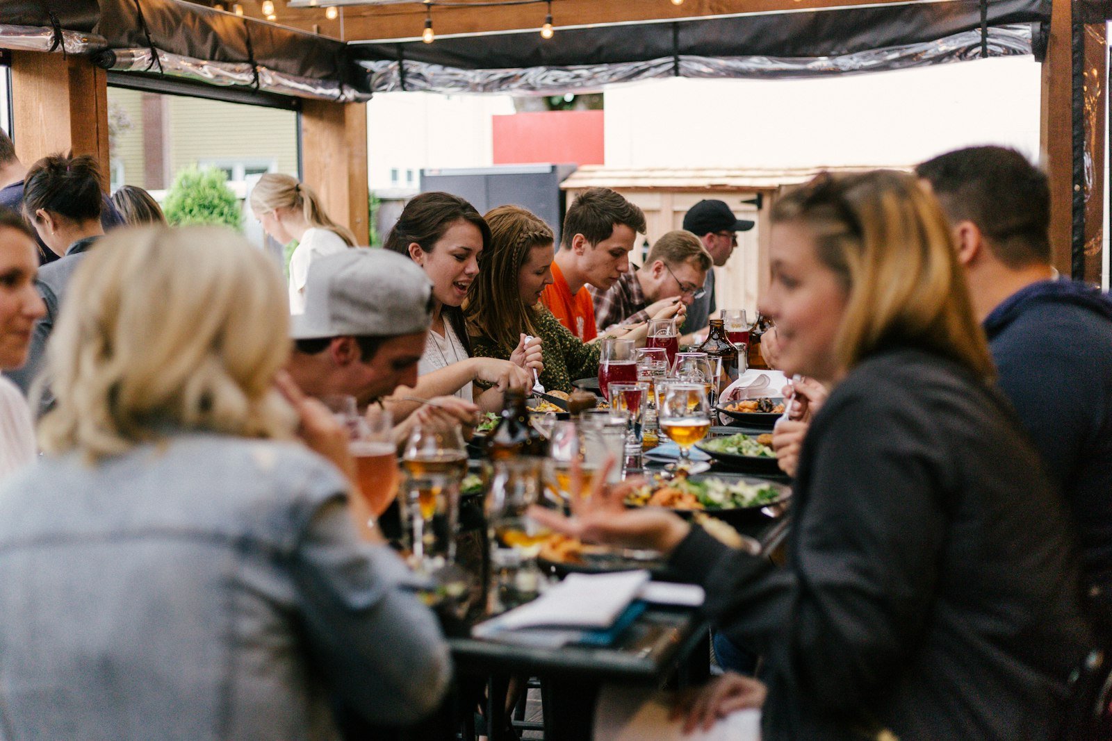 Culinary Prospect, friends gathered and celebrating around a table at a home gathering